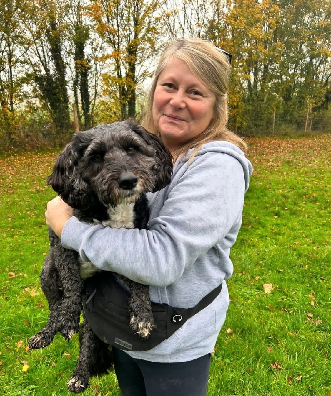 Julie providing house sitting care with a dog at Liberty's Pet Services